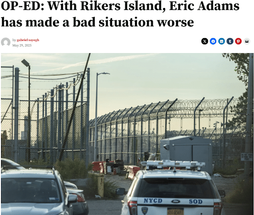 Screenshot of an op-ed titled “With Rikers Island, Eric Adams has made a bad situation worse” by Gabriel Sayegh. The image below the headline shows NYPD vehicles parked outside a fenced and barbed-wire perimeter of Rikers Island, capturing a stark and institutional environment.